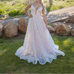 Light pink prom dress with butterfly accents